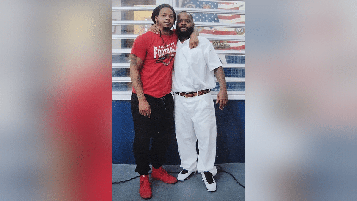 Toforest Johnson and his son, Robby Foster