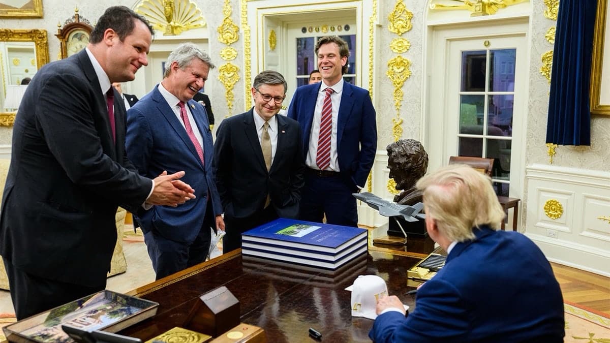 Lawmakers and James Braid stand before Trump in the Oval Office laughing