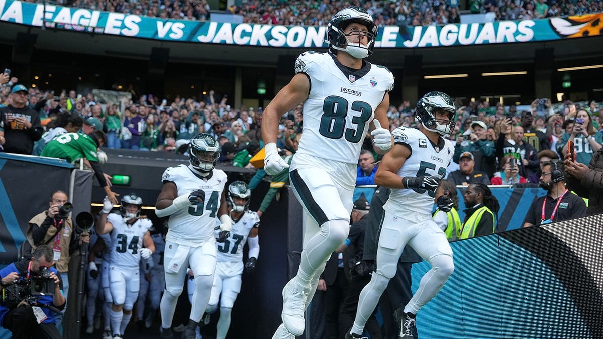 Johnny Mundt runs onto the field in London.