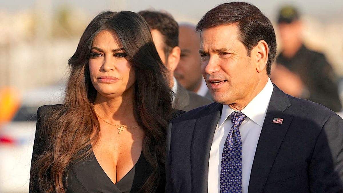 Secretary of State Marco Rubio and Ambassador Kimberly Guilfoyle board a plane at Athens airport.