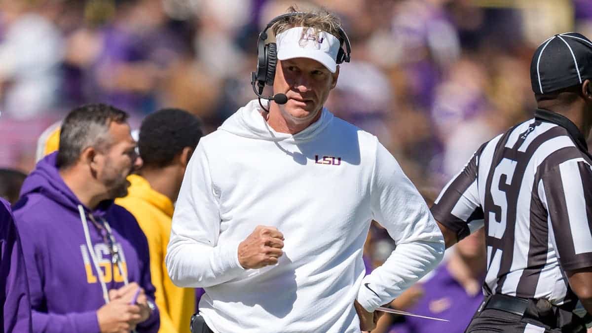 Lane Kiffin reacts on the sideline during a football game.