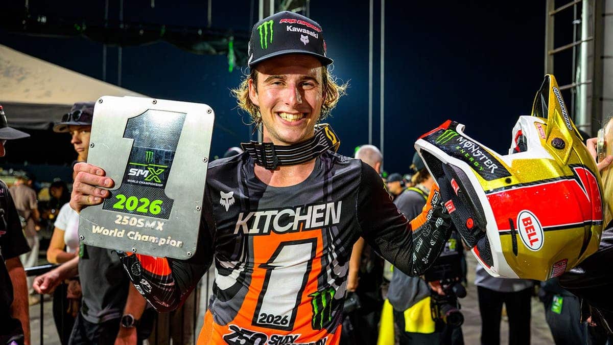 Levi Kitchen holds his 2026 Monster Energy SMX 250 Class World Championship trophy