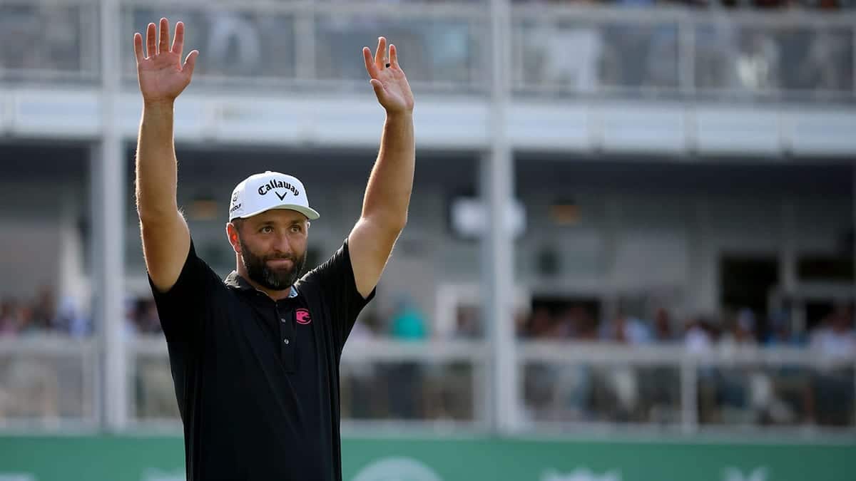 Jon Rahm waves to the crowd