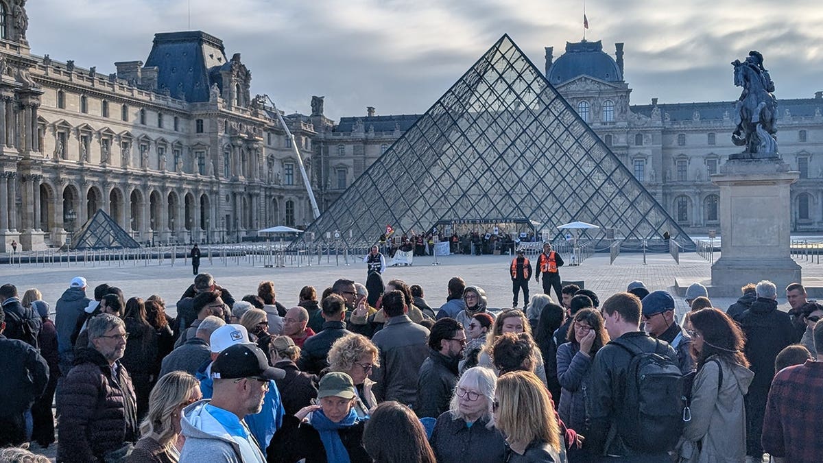 Protesters block the Louvre Museum entrances in Paris, France.