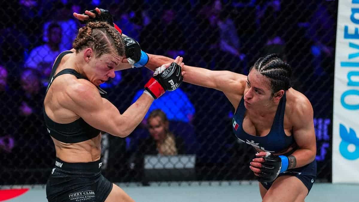 Lucero Acosta throws a punch against Shannon Clark during a PFL fight at Wintrust Arena.