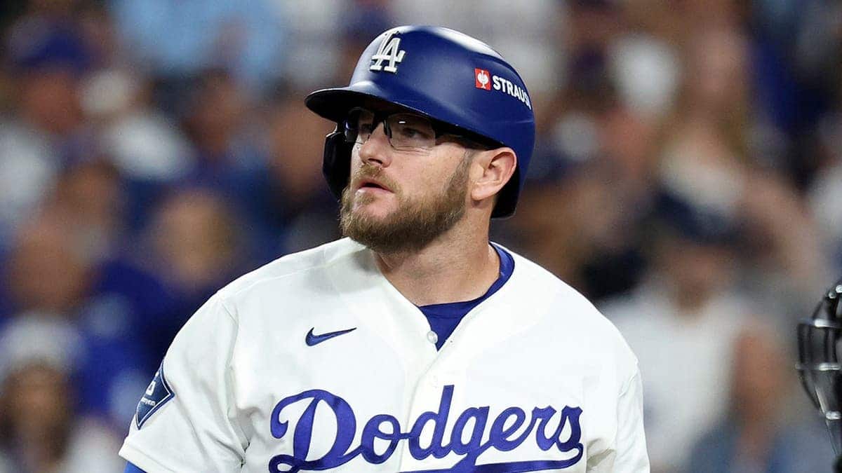 Max Muncy #13 reacts after striking out during Game 3 of the National League Championship Series.