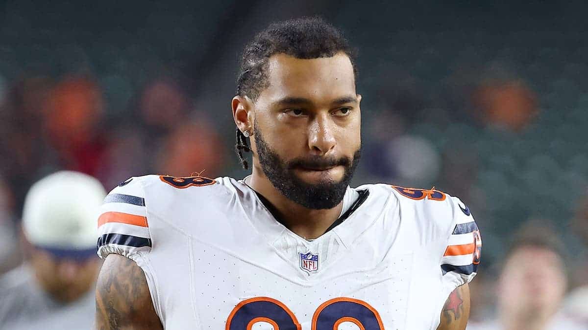 Montez Sweat stands on the field after a game at Paycor Stadium.