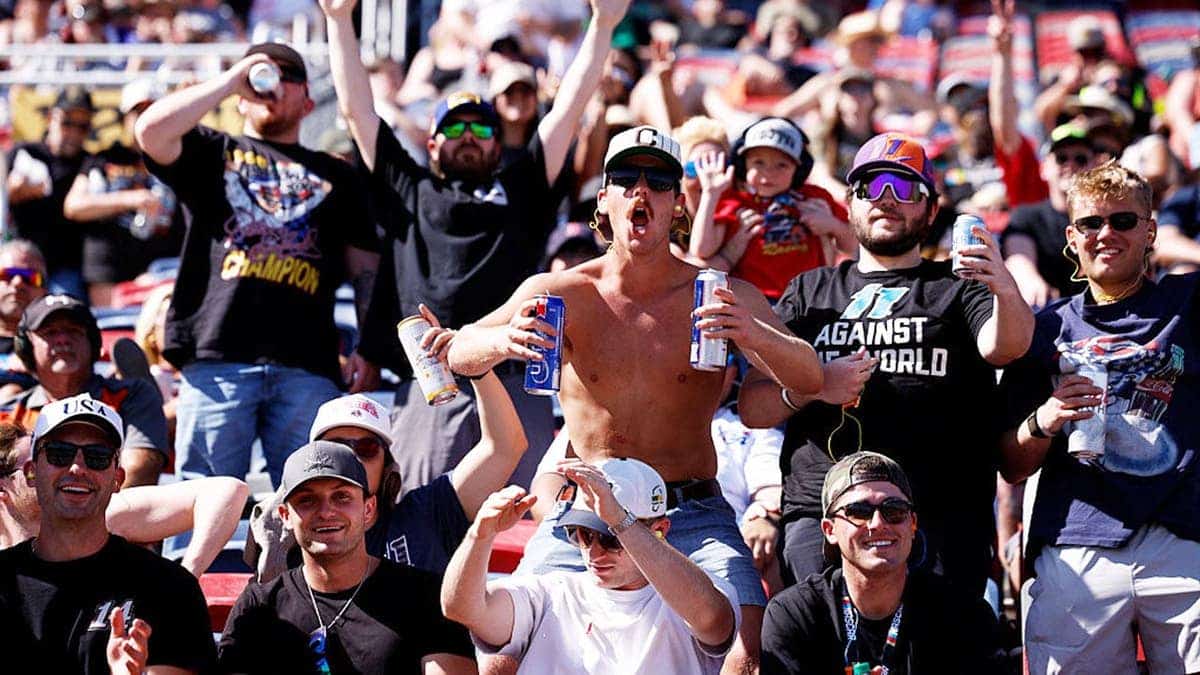 NASCAR fans cheer in the stands at Phoenix Raceway.
