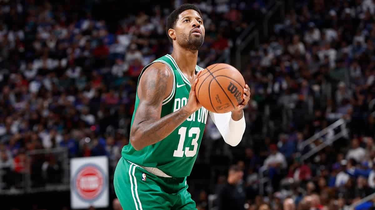Paul George shoots a free throw during a Boston Celtics game against the Detroit Pistons.