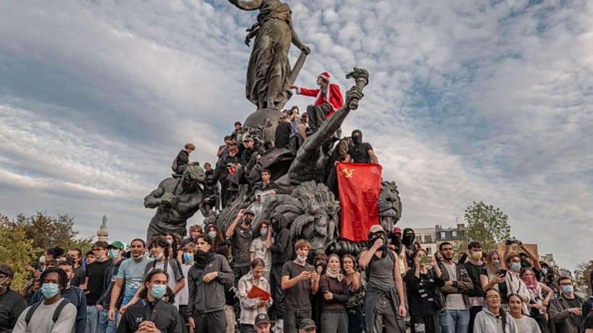 Protestors gather around the Monument à la République during Paris student protests on Oct. 4, 2026.