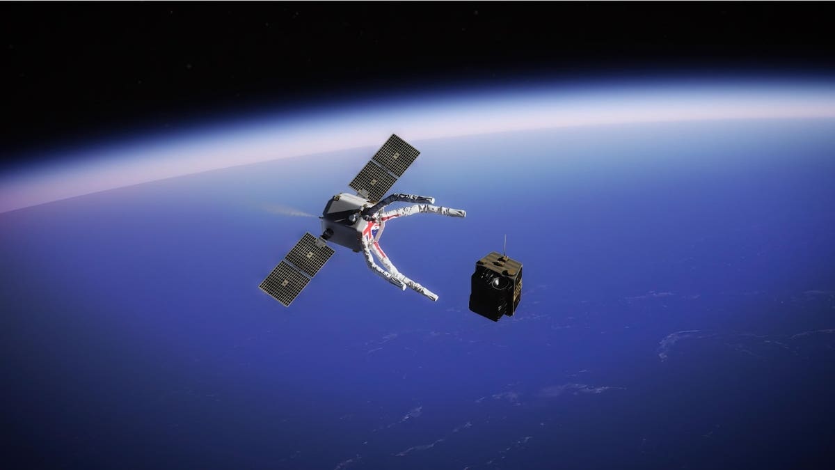 A claw grabbing a satellite