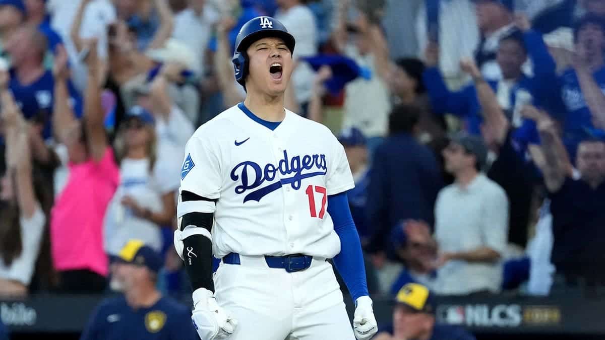 Shohei Ohtani reacts after hitting a three-run home run during the second inning against the Milwaukee Brewers.
