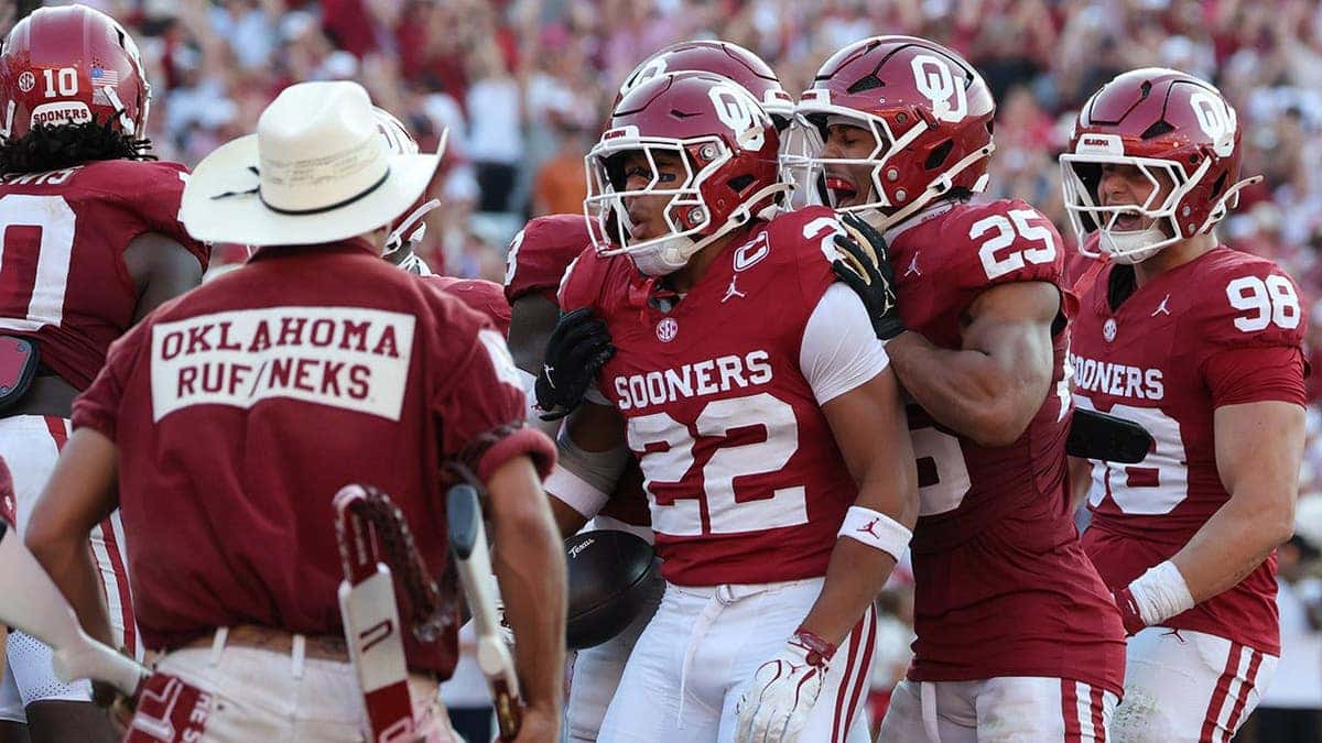 Oklahoma Sooners defensive back Peyton Bowen celebrates after scoring a touchdown.