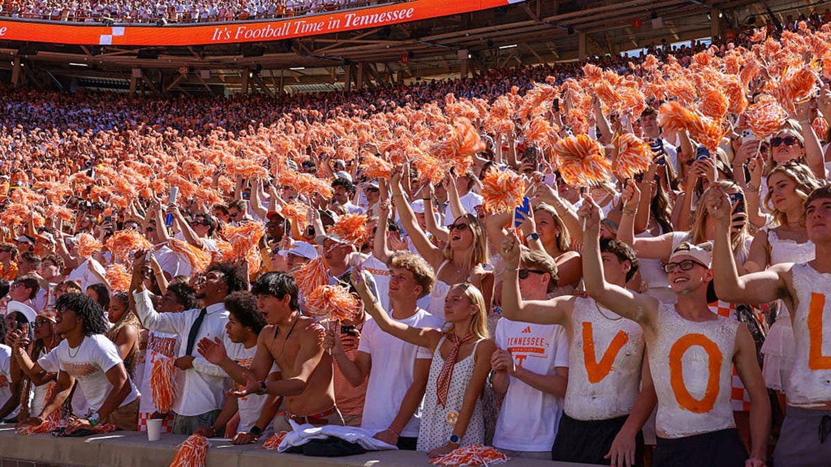 Tennessee Volunteers fans cheer before a game at Neyland Stadium.