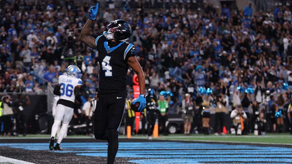 Tetairoa McMillan celebrates a touchdown at Bank of America Stadium.