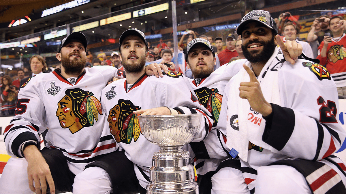 Viktor Stalberg (left), Niklas Hjalmarsson, Marcus Kruger, and Johnny Oduya