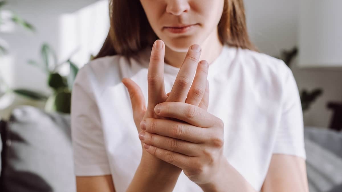 Woman with hand tremor